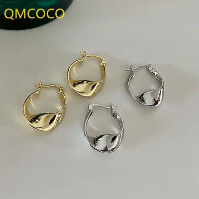 QMCOCO – boucles d'oreilles couleur argent pour femmes mode créative ajourée INS personnalité