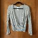 Brandy Melville Tops | Brandy Melville Zosia Striped Wrap Top Long Sleeve Black White Nwt | Color: Black/White | Size: One Size