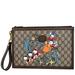 Gucci Bags | Gucci Disney Donald Duck Gg Supreme Canvas Zip Clutch Beige | Color: Brown | Size: Os