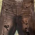 American Eagle Outfitters Jeans | Aeo | Black Distressed Super Super Stretch Hi-Rise Jegging Size 14. | Color: Black | Size: 14