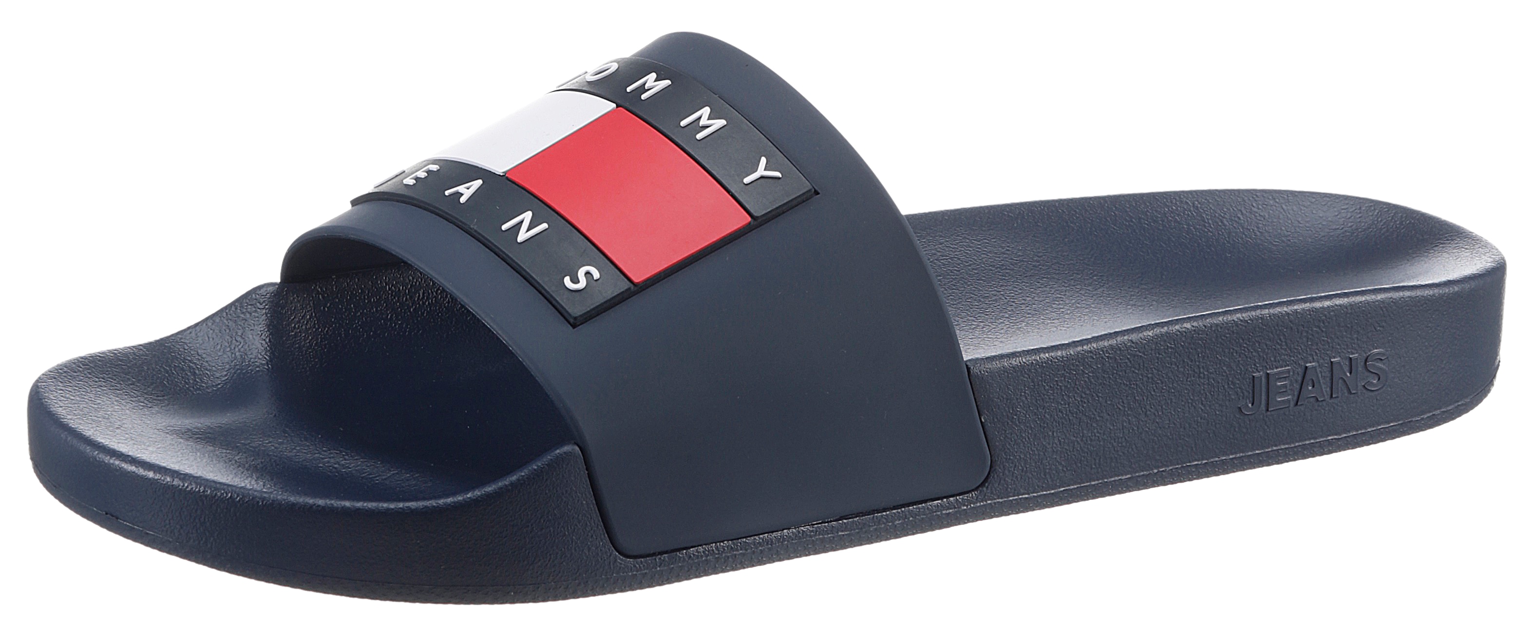 Badepantolette TOMMY JEANS "TOMMY JEANS POOL SLIDE ESS", Herren, Gr. 42, blau (dunkelblau), Synthetik, Schuhe Badelatschen Pantolette, Sommerschuh, Poolslides, Schlappen, mit plakativer Logoflag
