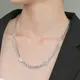 Collier pendentif Kpop pour hommes et femmes bijoux de mode coréens rue souriante rotative