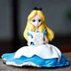 Figurine de Princesse Alice au Pays des Merveilles en PVC de 14cm Jouet Assise Semée avec