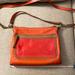 Coach Bags | Coach Cross Body Bag. Coral, Orange And Tan. Good Used Condition. | Color: Orange | Size: 12 Inches Long By 9 Inches Tall