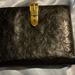 Gucci Bags | Gucci Ostrich Leather Compact Black Wallet | Color: Black/Gold | Size: Os