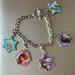 Disney Jewelry | Disney Frozen Movie Theme Charm Bracelet | Color: Blue/Silver | Size: Os