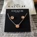 Coach Jewelry | Brand New Coach Rose Gold Flower Earrings And Necklace Set With Pouch | Color: Gold | Size: Os