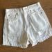 American Eagle Outfitters Jeans | American Eagle Distressed Denim 90s Boyfriend Mid Length Frayed Cutoff Shorts | Color: White | Size: 0