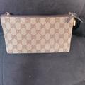 Gucci Bags | Authentic Gucci Monogram Clutch With Brand New Unbranded Adjustable Strap. | Color: Brown/Tan | Size: 8.7” W 5”H And 3”D At Base
