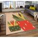 Tan/Green;tan Rectangle 4'7" x 7'3" Area Rug - East Urban Home Rectangle Devizes Machine Made Power Loom Area Rug in Tan/Green 87.0 x 55.0 x 0.16 in green/orange/pink/red | Wayfair