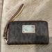 Michael Kors Bags | Michael Kors Leather Logo Wallet Wristlet | Color: Brown | Size: Os