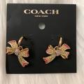 Coach Jewelry | Coach Pave Bow Huggies Earrings In Gold | Color: Gold | Size: Os