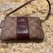 Coach Bags | Coach Wristlet Wallet. Dark Brown Maroon Leather And Coach Logo Design. | Color: Brown | Size: Os