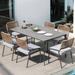 Hokku Designs Gennadius Rectangular 6 - Person 62.99" Long Outdoor Dining Set w/ Cushions Stone/Concrete/ in Gray | 62.99 W x 35.43 D in | Wayfair