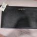 Michael Kors Bags | Bnwt Michael Kors Jet Black Pebble Leather Wristlet. | Color: Black/Gold | Size: Os