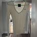 American Eagle Outfitters Sweaters | Aeo Cable Knit V-Neck Sweater, Cream/Ivory Color, Size Small | Color: Cream/White | Size: S