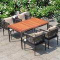 Hokku Designs Scammon Rectangular 4 - Person 59" Long Outdoor Dining Set w/ Cushions Wood/Wicker/Rattan in Black/Brown | 59 W x 35.4 D in | Wayfair