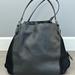 Coach Bags | Coach Black Edie 42 Mixed Leather Shoulder Bag | Color: Black | Size: 13 1/2" (L) X 12 1/4" (H) X 6 1/4" (W)