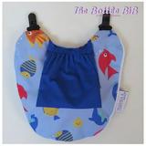 The Bottle Bib -Hands Free Feeding. Accelerate Baby s Feeding Independence. Keep Baby Bottles Food Pouches and Training Cups From Falling Onto Dirty Surfaces! Unisex Patterned Baby Feeding Bib.