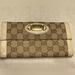 Gucci Bags | Authentic Gucci Brown Monogram Vintage Canvas Wallet | Color: Brown/Cream | Size: Os