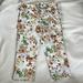 Disney Pants & Jumpsuits | Disney Alice In Wonderland Flower Capris Sz 8 | Color: Green/White | Size: 8