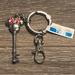 Disney Accessories | Disney Parks Minnie Mouse Key Shaped Keychain Bag Charm Nwt | Color: Red/Silver | Size: Os