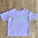 Converse Shirts & Tops | Girl’s Converse All Stars Lavender T-Shirt | Color: Purple/Silver | Size: Mg