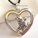 Disney Jewelry | Disney Minnie Mouse Crystal Heart Necklace Black Cord Silver Plated | Color: Red/Silver | Size: Os