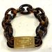 Michael Kors Jewelry | Michael Kors Bracelet. Tortoise Id Style In Gold Tone. | Color: Brown/Gold | Size: Os