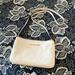 Michael Kors Bags | Michael Kors Ivory Leather Bag. Cross Body. Three Compartments. Used Once | Color: Cream | Size: 6x9