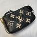 Louis Vuitton Accessories | Louis Vuitton Mini Pochette Accessoires Bicolor Monogram Empreinte Leather | Color: Black/White | Size: Os