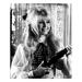 Brigitte Bardot Standing w/ Gun in Hand - Unframed Photograph Paper in Black/White Globe Photos Entertainment & Media | 24 H x 20 W x 1 D in | Wayfair