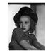 Betty Grable Looking Away - Unframed Photograph Paper in Black/White Globe Photos Entertainment & Media | 20 H x 16 W x 1 D in | Wayfair