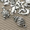 100pcs Marine Charm Collection Craft Supplies Marine Life Seashell Charms Pendants for Crafting Jewelry Findings Making Accessory DIY Necklace Bracelet(Marine Charms)