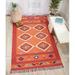 Orange/Red 66 x 42 x 0.25 in Area Rug - Foundry Select Farrah Tribal Bohemian Orange Handmade Area Rug | 66 H x 42 W x 0.25 D in | Wayfair