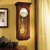 Howard Miller® Chiming Key-Wound Lewis Wall Clock Wood/Glass in Brown/White/Yellow | 33.5 H x 14.5 W x 6.75 D in | Wayfair 613637