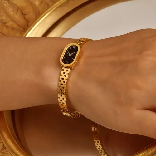 Damenmode Edelstahl Uhr geformte Manschette Armreif Goldfarbe Metall Armbänder elegante Dame