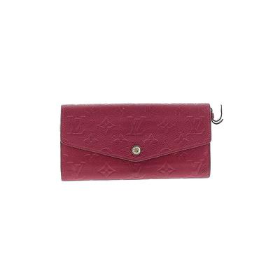 Louis Vuitton wallet in burgundy imprinted monogram leather, In