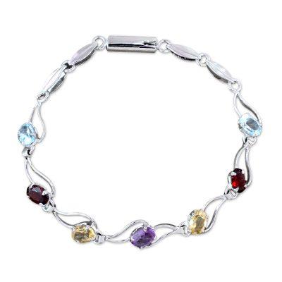 Garnet and blue topaz link bracelet, 'Colors of Life'