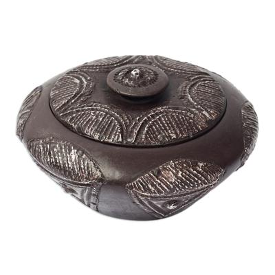Brekusu,'Hand Carved Circular Box and Lid in Wood with Repousse'
