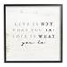 Stupell Industries Love Is What You Do Phrase Framed On Wood Graphic Art Wood in Brown/White | 24 H x 24 W x 1.5 D in | Wayfair ax-313_fr_24x24