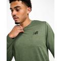 New Balance Tenacity Football Training long sleeve top in green