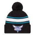 Men's New Era Black Charlotte Hornets White Stripe Cuffed Pom Knit Hat