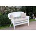 White Wicker Patio Love Seat With Tan Cushion And Pillows