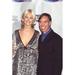 Gretha Cavazzoni In Silver And Sheer Dress & Tommy Hilfiger In Blue Pinstripe Suit Vh1 Fashion Awards Photo Print (8 x 10) - Item # CPA2527