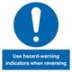 Hinweisschild mit Aufschrift "Use Hazard Warning Indicators When Reversing", 300 x 300 mm, S30