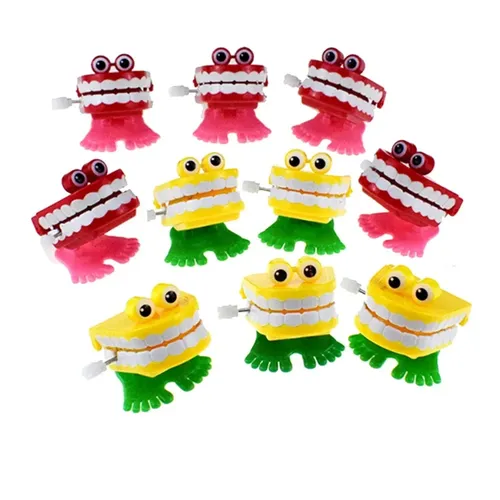 1pc Zähne formen Uhrwerk Spielzeug mit Kette Neuheit String Up Springen Gehen Mund Spielzeug Kinder