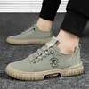 2025 männer Schwarz Casual Schuhe Frühling Sommer Mode Flache Skateboard Leinwand Schuhe Jugend Neue Design Faulenzer Sneaker Große Größe 44