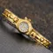 Frauen Armbanduhr Gold Armband Kleine Zifferblatt Elegante Uhr mit Herz Anhänger Weibliche Damen