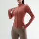 Veste de sport à manches longues pour femmes vêtements de yoga à séchage rapide survêtement de